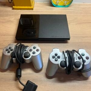 PS2 slim - avec cables et manettes - bon état - pal